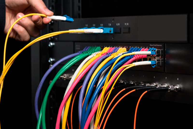 What are fiber optics, and how were they invented?
